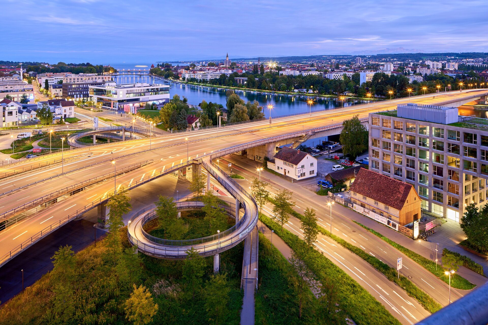 View of the Rhine and Konstanz from the observation deck of the Panorama Tower at dusk.